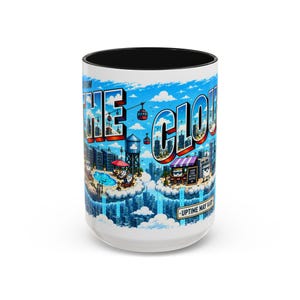 May include: A white ceramic mug with a black interior featuring a colorful graphic of a city skyline built on clouds. The design includes the text "THE CLOUD" and "UPTIME MAY VARY" with pixelated buildings, cable cars, and small character figures.