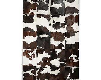 Handgemaakt koeienhuid patchwork vloerkleed: rustiek hair-on-hide leren tapijt westers interieur