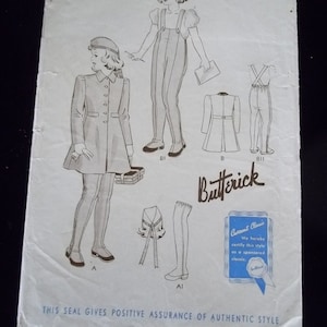 May include: A vintage sewing pattern for a girl's dress and overalls. The pattern is from Butterick and is size 3, 22 breast, and costs 25 cents. The pattern includes a coat, overalls, and a hat.