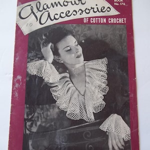May include: A vintage craft booklet titled Glamour Accessories of Cotton Crochet, Book No. 176. The cover features a black and white photograph of a person wearing a white crocheted ruffled collar and matching cuffs, with the text Portrait Ruffle.
