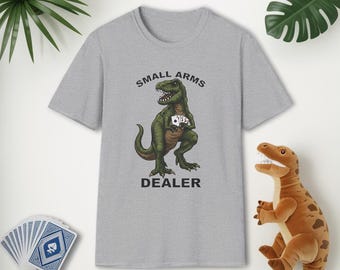Funny Small Arms Dealer T-Rex Shirt, Dinosaur Pun Tee, Hilarious Graphic T-Shirt for Men & Women, Great Gift for Dad, Friend, or Coworker