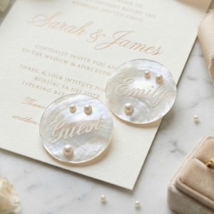 May include: A rustic wooden sign with the text "Welcome to our home" in white lettering. The sign has a distressed finish and a simple, inviting design, suitable for a front porch or entryway.