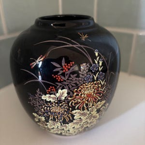Vintage black vase with floral design circa 1980s
