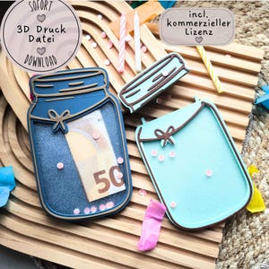 May include: Two 3D printed mason jar containers, one dark blue and one light blue, each featuring a decorative bow detail. The dark blue jar contains a 50 Euro banknote. The image includes text overlays reading SOFORT 3D Druck Datei DOWNLOAD and incl. kommerzieller Lizenz.