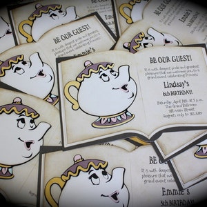 May include: A stack of invitations with a cartoon teapot illustration. The invitations are for a birthday party and say "Be Our Guest!" with the child's name and age. The invitations are decorated with a yellow and brown striped pattern.