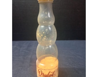 Loción fijadora para el cabello DRYFAST BY MONIQUE, botella vintage de 80 oz.