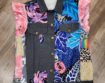 Scrappy upcycled patchwork vest with ruffles at shoulders.