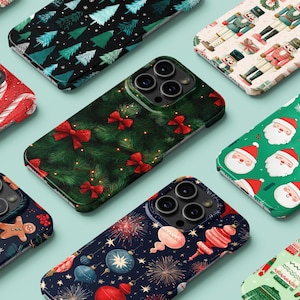 May include: A collection of phone cases with festive Christmas designs. Patterns include candy canes, Christmas trees, Santa faces, bows, and ornaments. The cases are in various colors, including red, green, and navy blue.