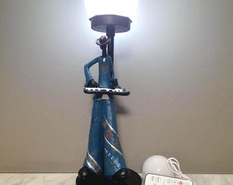 Unique blue piano player USB table lamp for music lovers