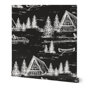 May include: Black and white illustration of a cabin in the woods with trees and a lake. The cabin has a triangular roof and windows. The illustration is repeated to create a seamless pattern.