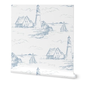 May include: A white and blue wallpaper pattern featuring a repeating design of a lighthouse, a house, and sailboats. The design is drawn in a sketch style.