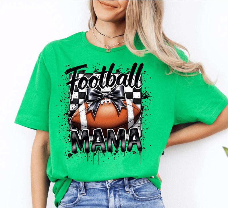 A irish green Football Mama graphic t shirt featuring a stylish football design with a checkered pattern and a bow.