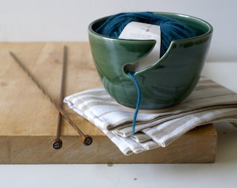 Handthrown pottery yarn bowl in glossy green made with british stoneware clay
