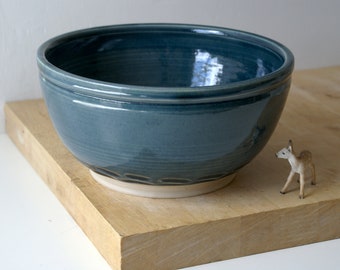 Large hand thrown pottery fruit bowl glazed in ice blue