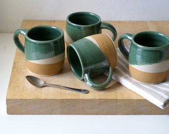 Set of two cozy stoneware pottery tea mugs glazed in forest green and brown