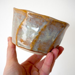Handmade stoneware faceted tea bowl glazed in shoreline brown