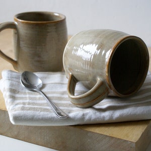 Set of two cozy stoneware pottery tea mugs glazed in glossy grey image 1