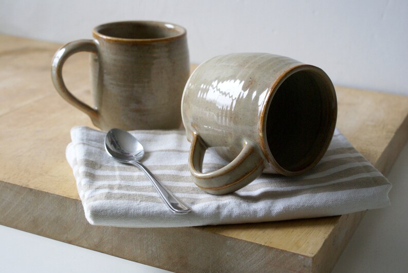 Set of two cozy stoneware pottery tea mugs glazed in glossy grey image 1