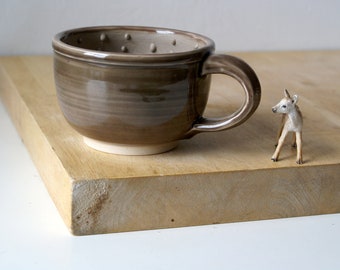 Stoneware shaving bowl glazed in brown