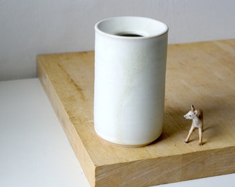 Hand thrown minimalist pottery vase in matte vanilla cream