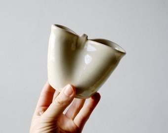 Folded stoneware squishy ceramic pouring jug for milk glazed in simply clay