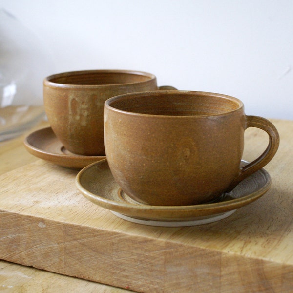 Pottery cappuccino cups and saucers - a handmade set of two in natural brown