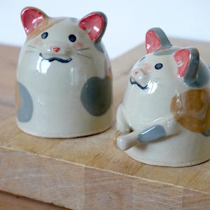 Handmade ceramic cat figurine with unique hand painted finish
