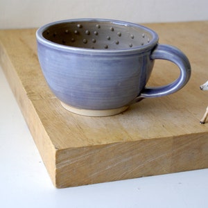 Hand thrown shaving bowl in purple and brown made with stoneware clay