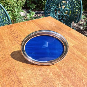 Vintage Silver Plated Oval Picture Frame With Rope Edge Design.