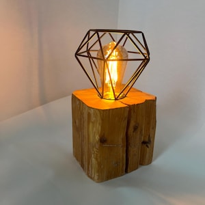 Wooden lamp made from an old wooden beam