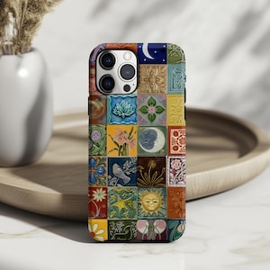 May include: A colorful phone case featuring a patchwork design of various square tiles. Each tile displays a unique image, including flowers, moons, and suns. The case has a glossy finish and a camera cutout.