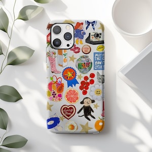 May include: A white phone case covered in colorful illustrations. The design includes a cowboy boot, a fishbowl, a monkey, a camera, and the text "Maybe this is how it start".