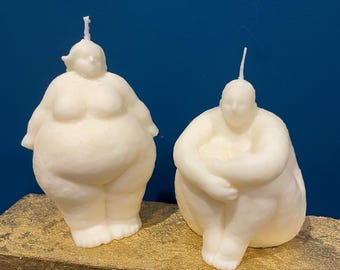 Sitting and standing two fat ladies chubby woman body torso candles abstract fragranced