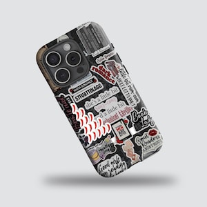 May include: Black phone case covered in stickers with text like "dark romance", "Book Lady", and "Good girls we reading books". The case has a camera bump and a glossy finish.