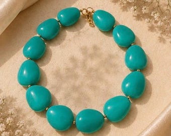 Conjunto de collar y pendientes hecho a mano