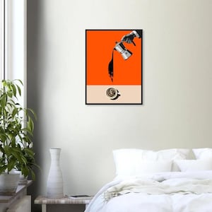 May include: A black and silver coffee pot pours coffee into a white cup with a swirl of coffee on a peach background. The coffee pot is held by a hand wearing a black suit sleeve.