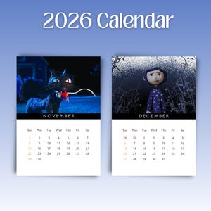 May include: A 2026 calendar featuring images from a movie. The November page shows a black cat with a red object, while the December page displays a girl in a starry outfit. The calendar includes the days of the week and dates.