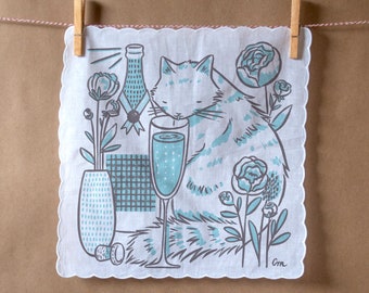 100% cotton handkerchief with scalloped edge with Champagne Kitty screen print