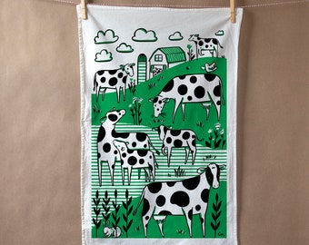 Flour sack tea towel with Green field Cows print