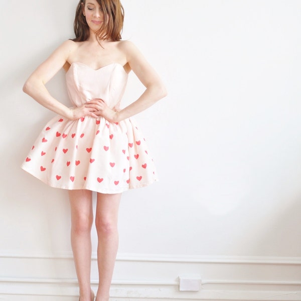 a valentine dress if ever there were one . pink and red heart print .medium