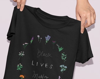 Black Lives Matter ring of flowers t shirt . botanical protest tee
