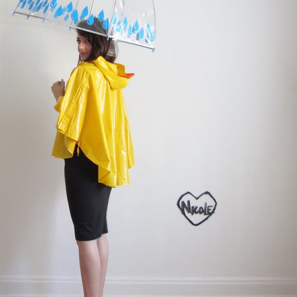 kid duck raincoat . april showers . pvc puddle duds poncho .small.medium .sale