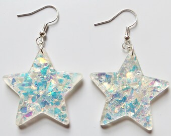 Clear reflecting glittery sparkle star earrings