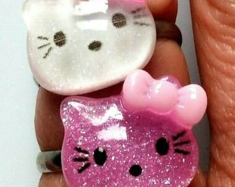 Pink and white kitty head rings