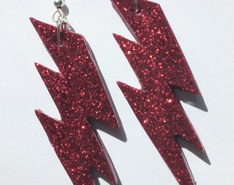 Red glitter lightning flash earrings