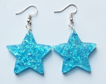 Turquoise reflecting glittery sparkle star earrings