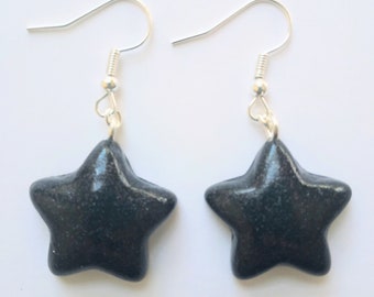 Black glossy glitter sparkle star earrings