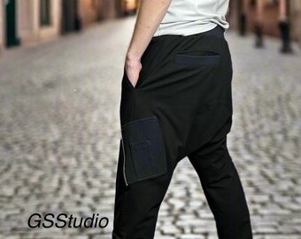 Schwarze Baumwoll-Haremshose für Herren mit seitlichen Taschen und Reißverschluss-Detail