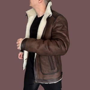 Chaqueta de piel de oveja para hombre: abrigo de invierno de piel de cordero auténtica con cuello alto y cremallera / chaqueta bomber cálida de piel de oveja