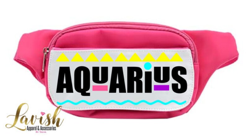 May include: A pink fanny pack with a white patch that says "AQUARIUS" in black letters with colorful accents. The patch has a yellow, blue, and pink geometric design.
